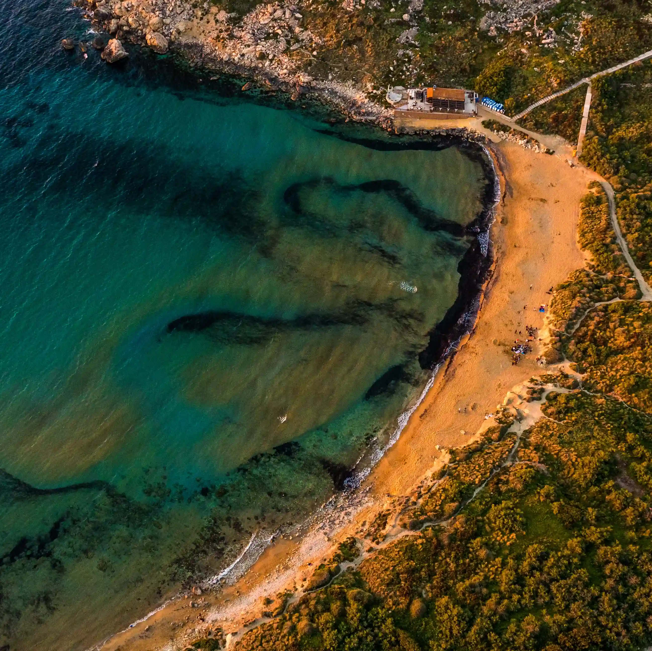 Ghajn Tuffieha Bay Ghajn tuffieha bay, one of the top things to do in Malta and recipient of the blue flag status.