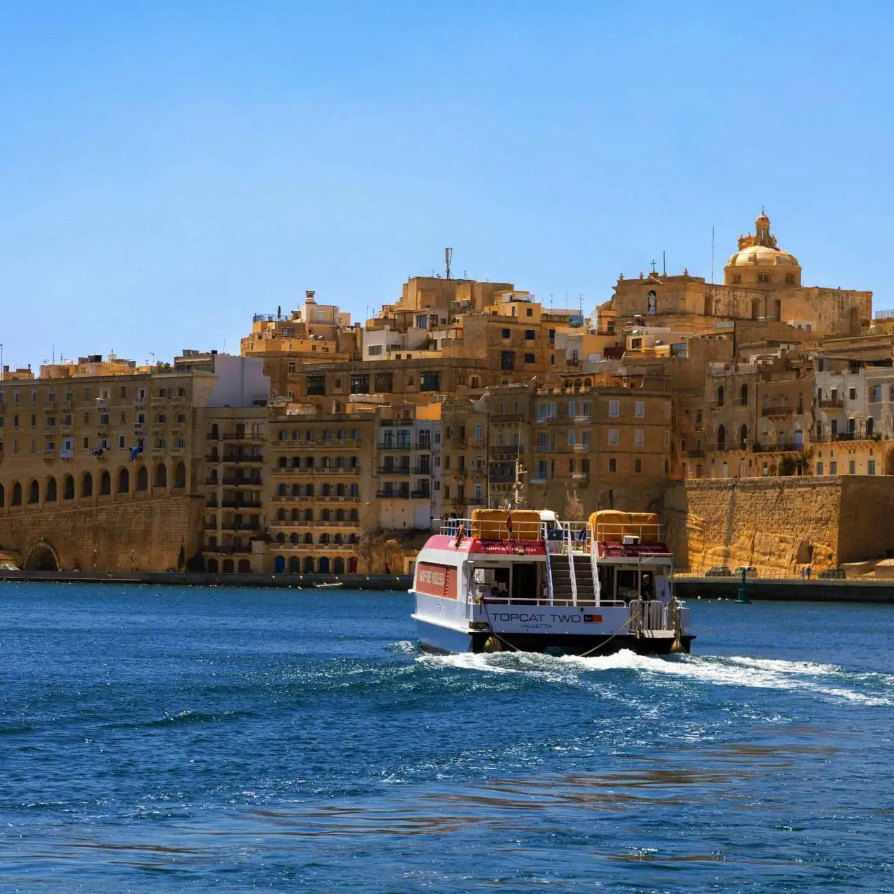 Sliema-Valletta Ferry A shot of the Sliema-Valletta ferry, on it's way to the capital during a bright sunny day in Malta.