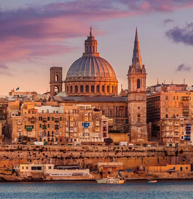 Valletta Dome A closeup shot of the Valletta Dome overlooking the harbor, including typical Maltese balconies peppering the seafront.