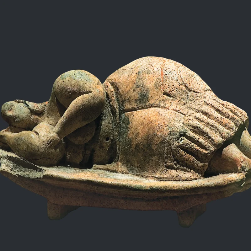 Statue of the Sleeping Goddess of fertility, dated circa 3000-3500 BC.