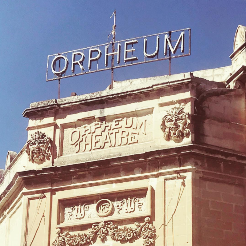 A photo of The Orpheum Theatre facade, an art nouveau masterpiece built in the 1930s next to the Gzira promenade.
